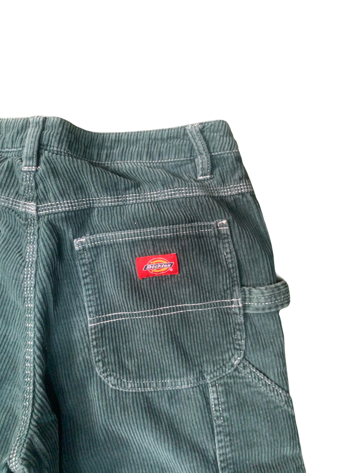 Green corduroy Dickies pants.